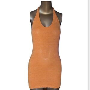Orange knit halter dress. Adjustable tie at neck backless